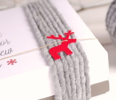 Square box decorated with wool