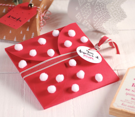Box with pompoms for...
