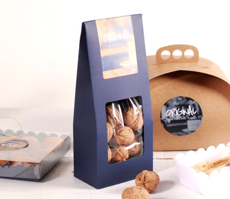 Decorated box for nuts with a window.