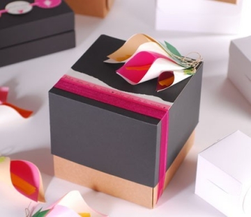 Cube-shaped gift box with paper flowers