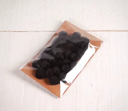 Pompones Blancos o Negros