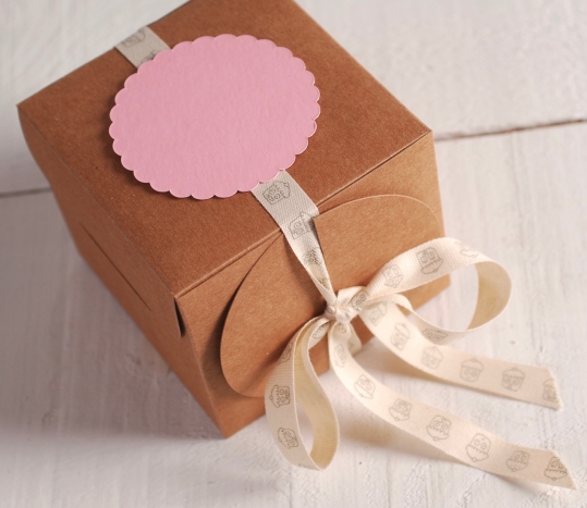 Box with ribbon for cupcakes