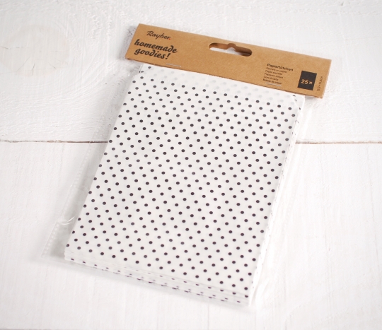 White paper bags with black spots 