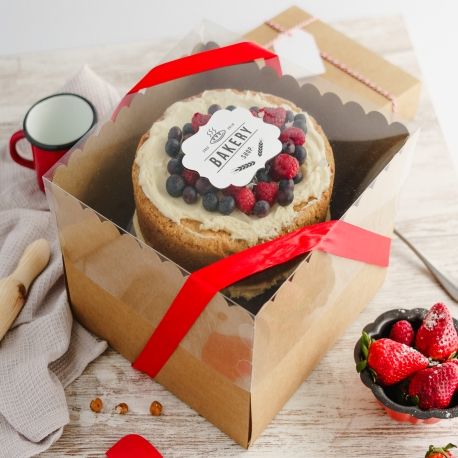 Box for cakes with a see-through lid