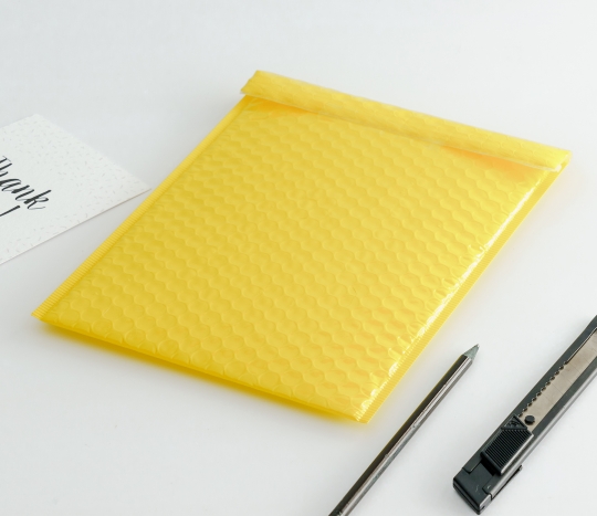 Gloss-finish delivery envelopes.