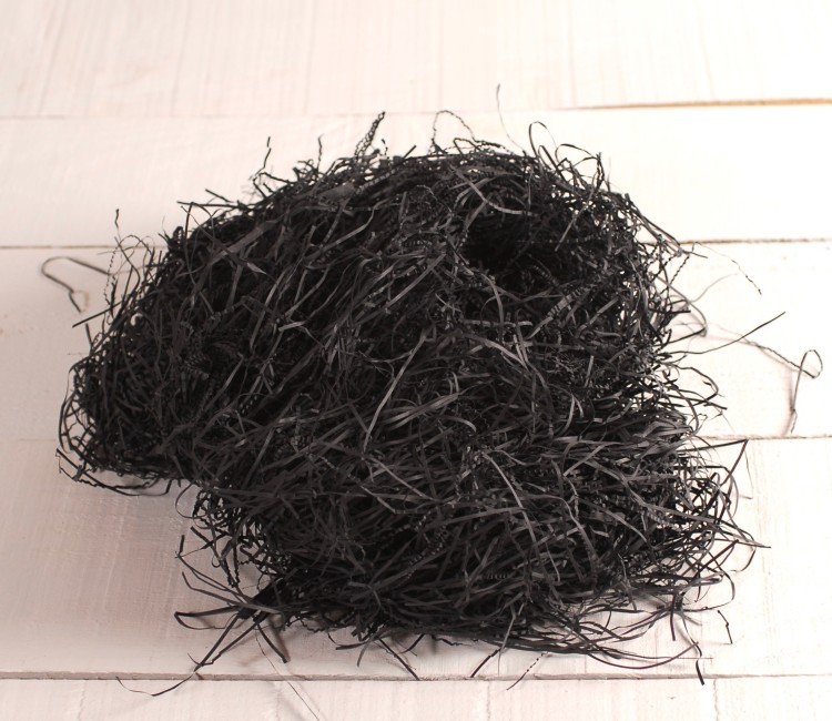 Papierschnipsel als Füllung von Kartons Papierschnipsel als Füllung von Kartons