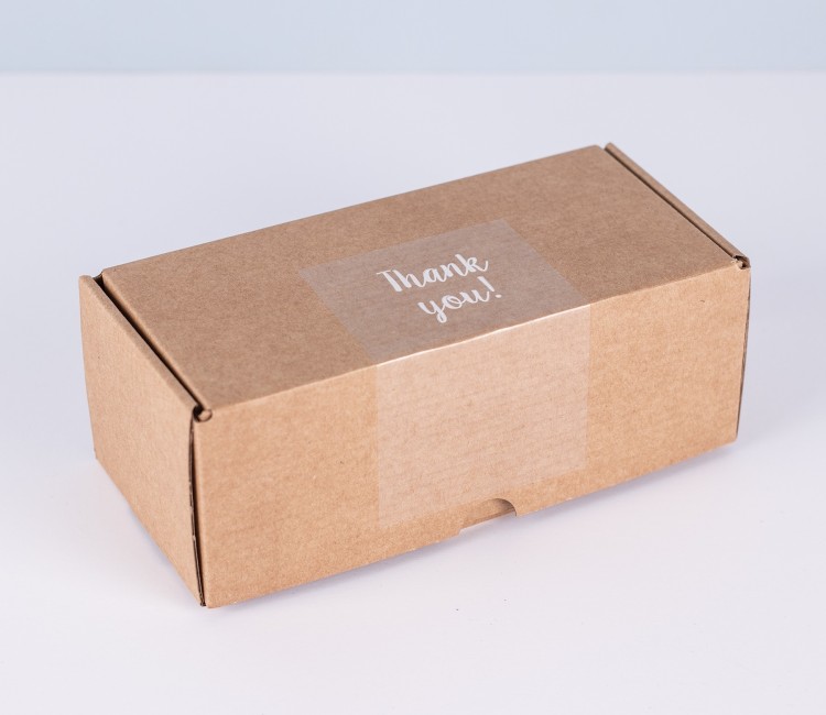Transparent "Thank you" label for deliveries.