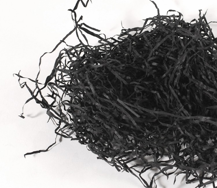 Papierschnipsel als Füllung von Kartons Papierschnipsel als Füllung von Kartons