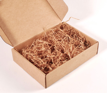 Copeaux de papier pour garniture de boîtes en carton