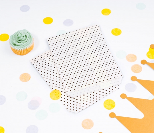 White paper bags with black spots 